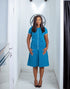 Blue box pleat dress with piping