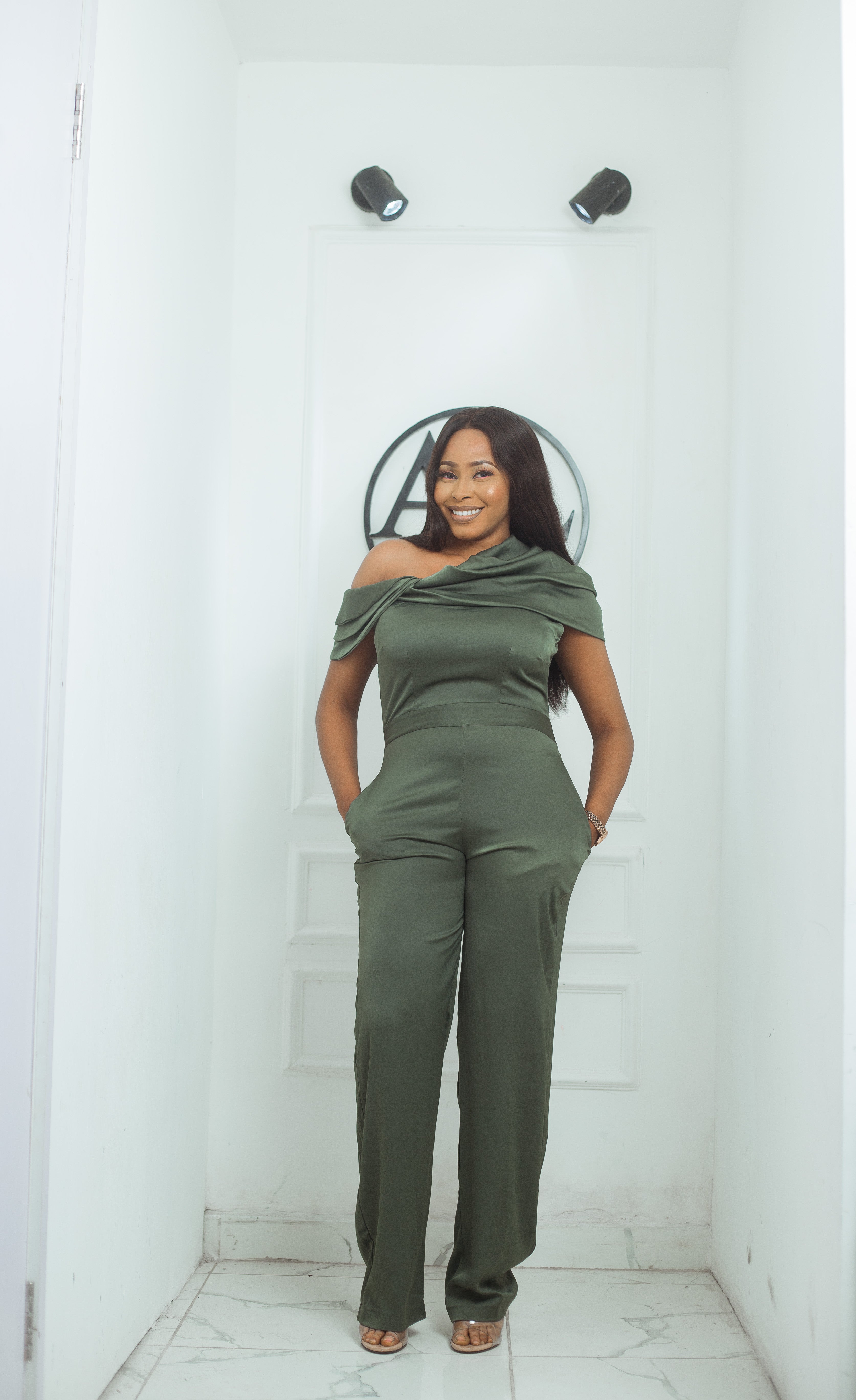 Green best sale cape jumpsuit