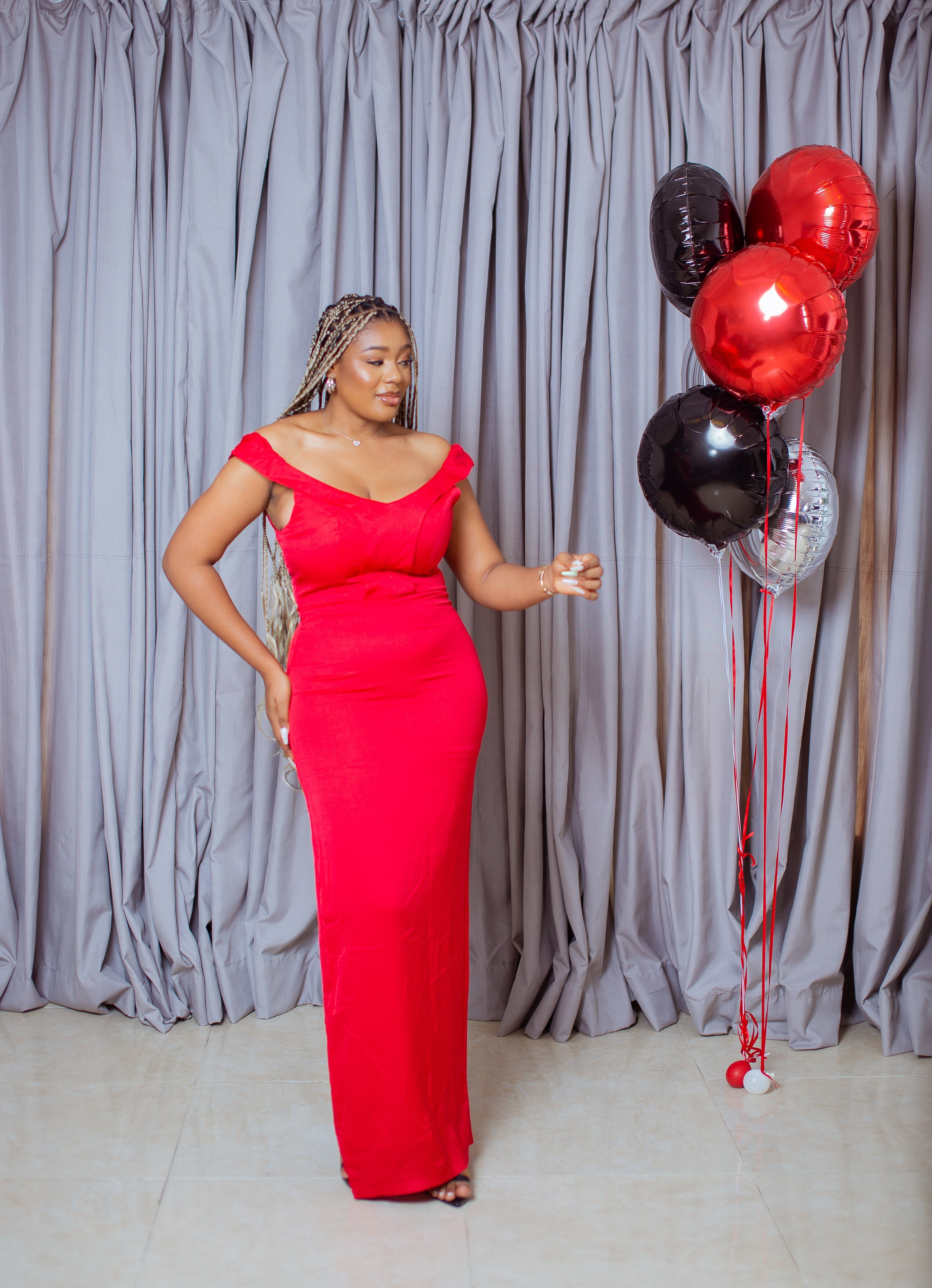 Red off shoulder floor length gown