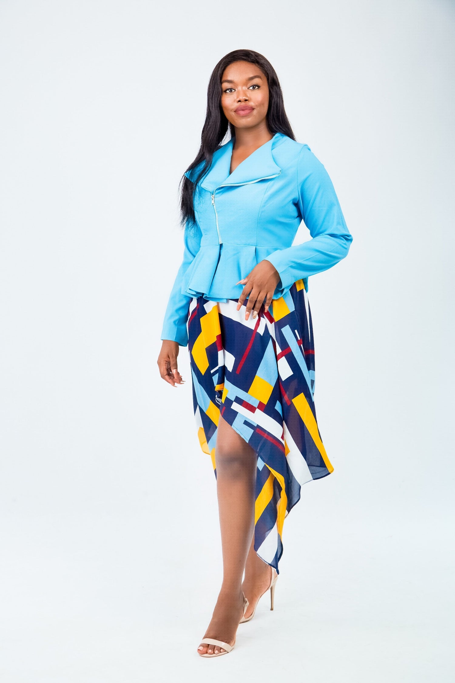 Two piece skirt set with dramatic hem and structured jacket